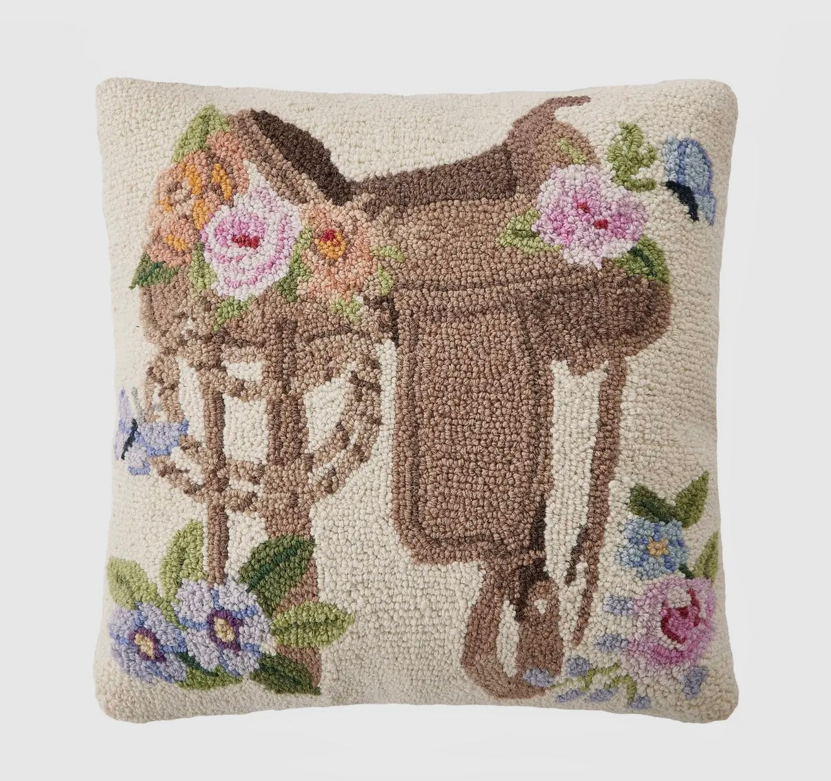 Wool floral saddle pillow with western cowgirl design