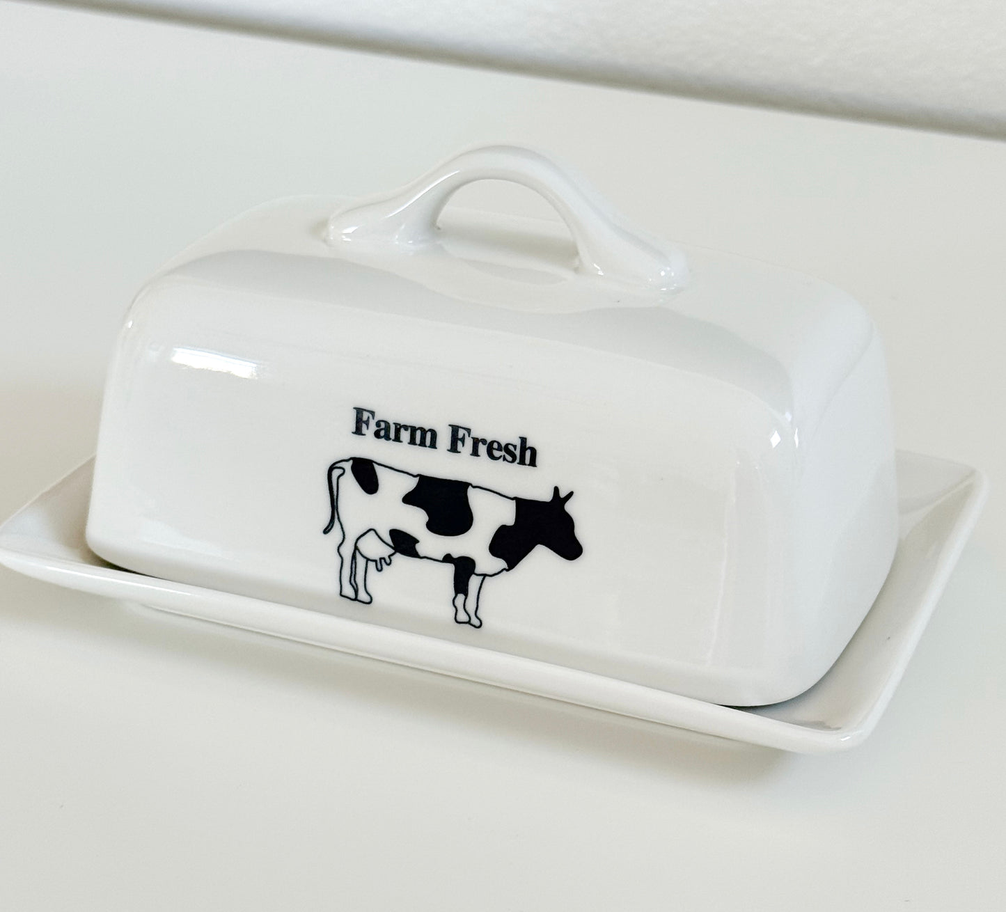 Farm Fresh cow butter dish in white ceramic farmhouse style