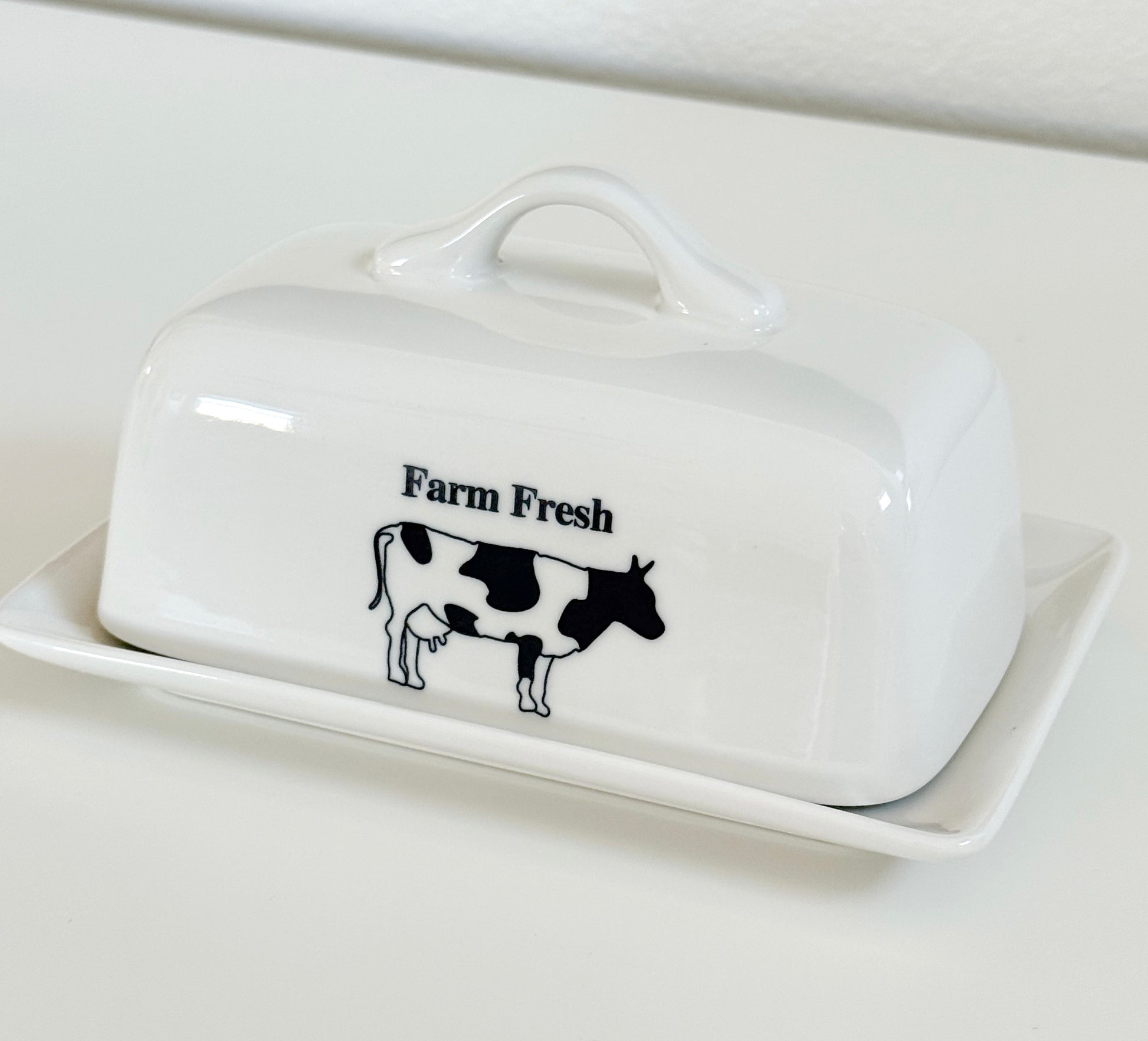 Farm Fresh cow butter dish in white ceramic farmhouse style