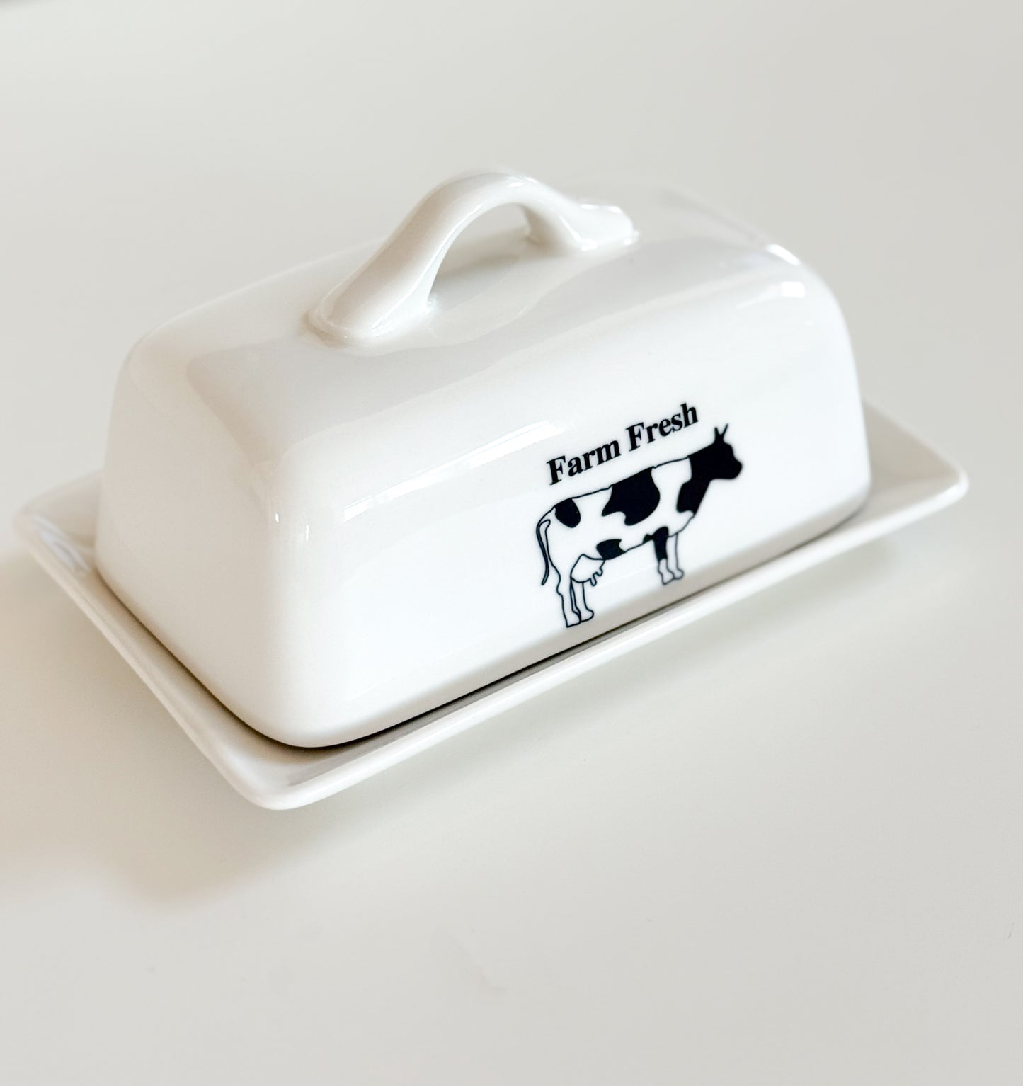 Farm Fresh cow butter dish in white ceramic farmhouse style