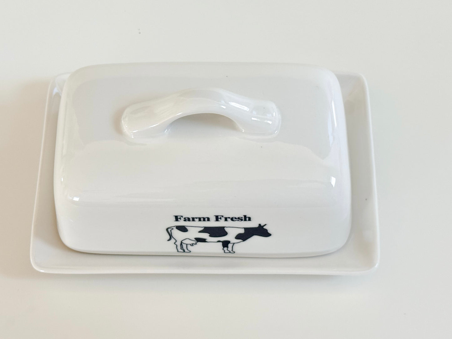 Farm Fresh cow butter dish in white ceramic farmhouse style