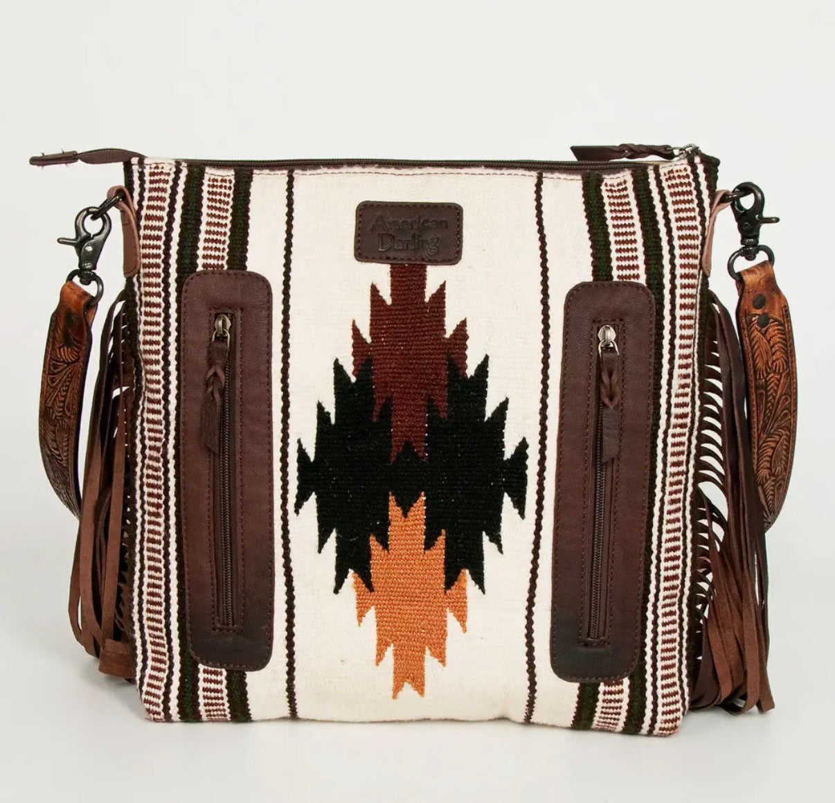 southwestern tooled leather fringe purse with aztec design