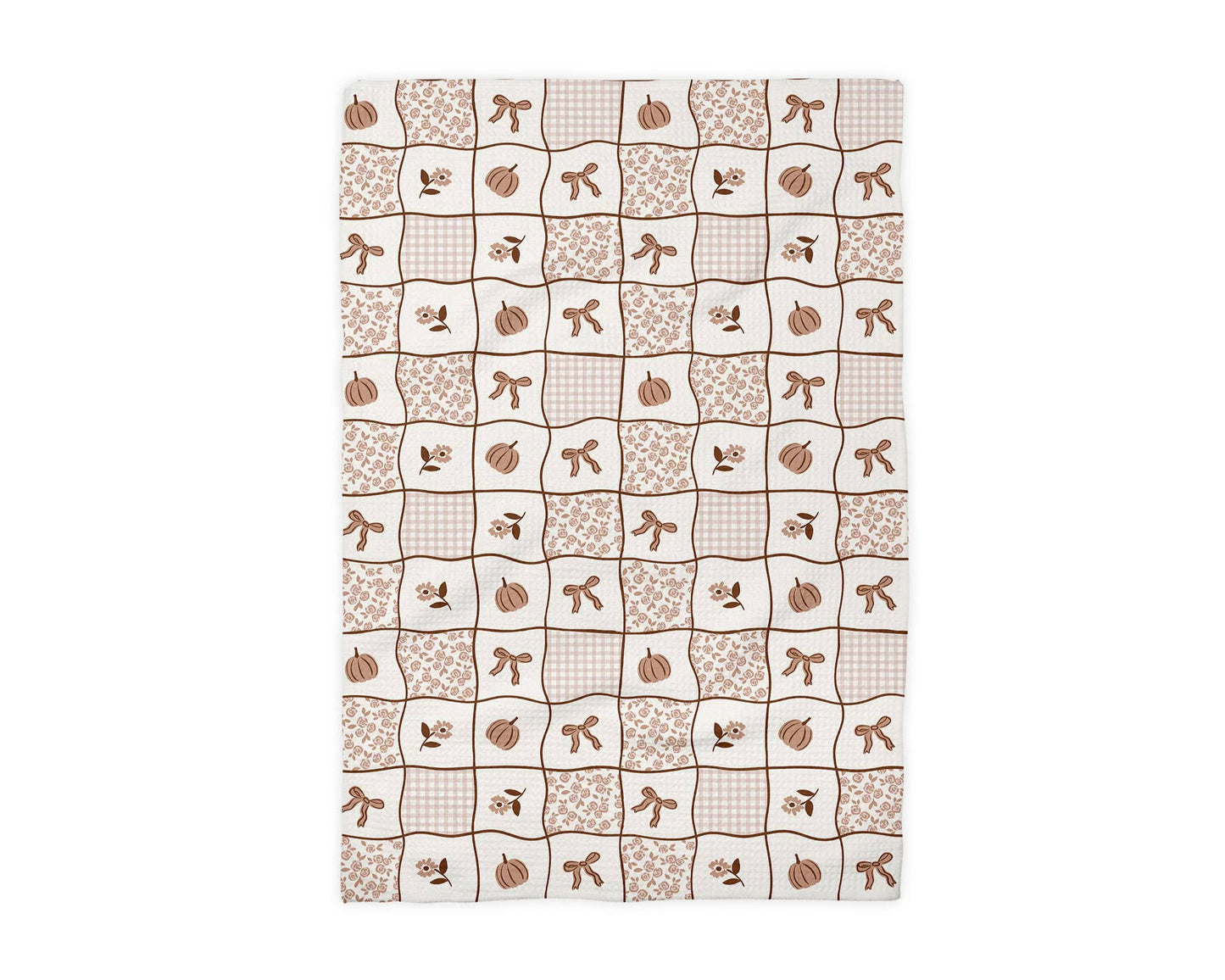Neutral pumpkin patchwork waffle kitchen towel with bows and floral fall design