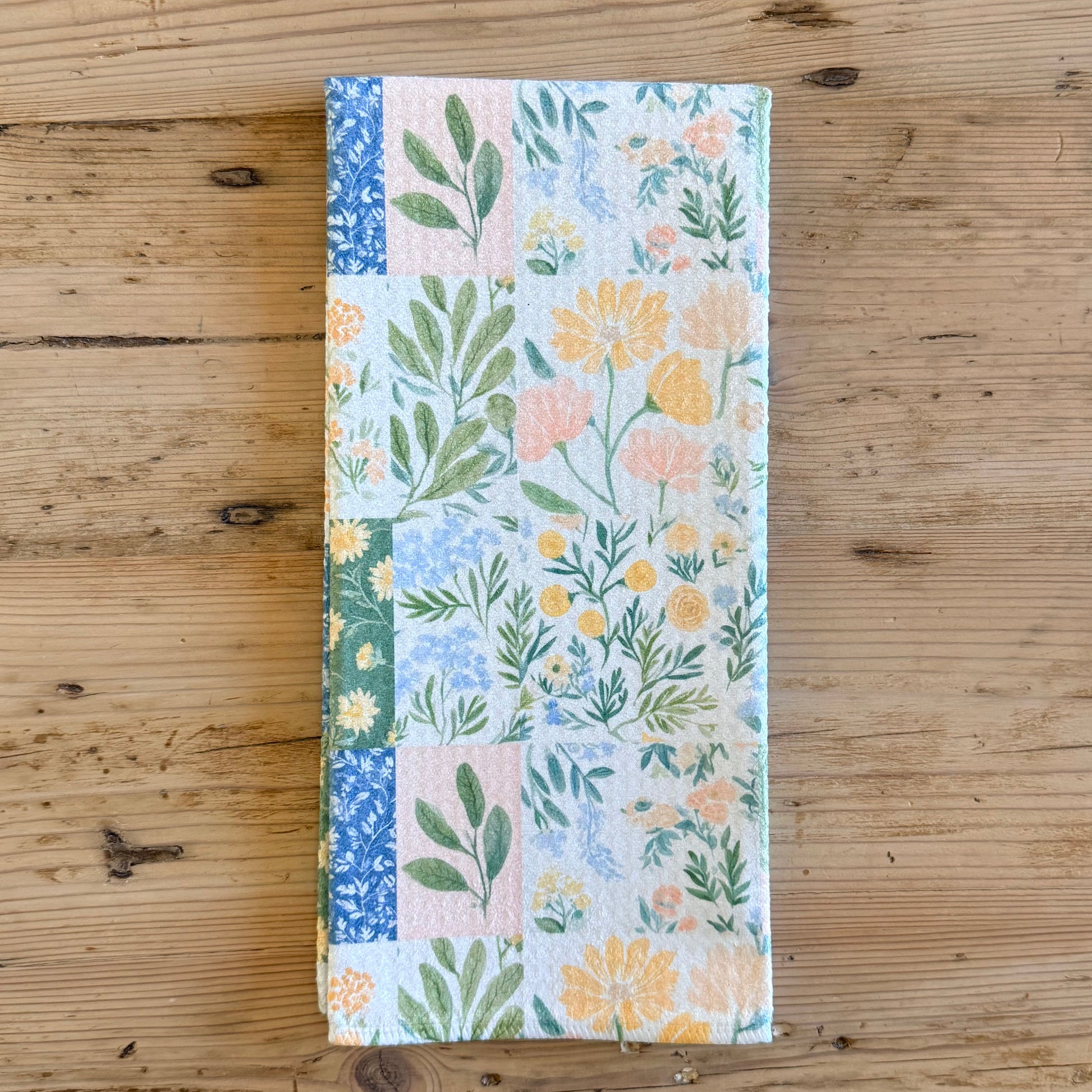 Floral patchwork quilt kitchen towel with blue green and yellow botanical print