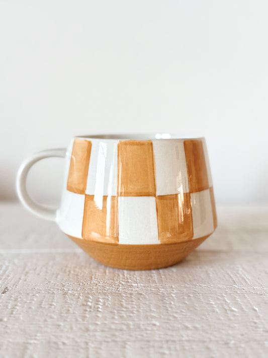 Handpainted checkered stoneware mug