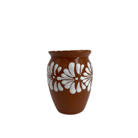 Ceramic vase with white floral patterns on a white background - cantarito